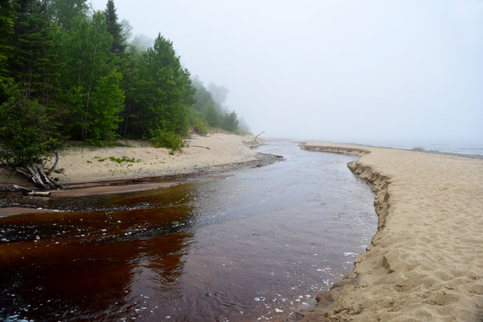 Fog rolling in on the Lake Superior shoreline, Grand Marais, Michigan